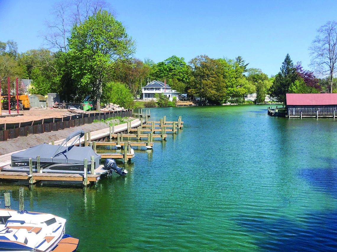 Two restaurants and Leland Township are updating or plan to update their shoreline components to the Leland River as it widens and turns toward Lake Michigan. Enterprise photo by Alan Campbell