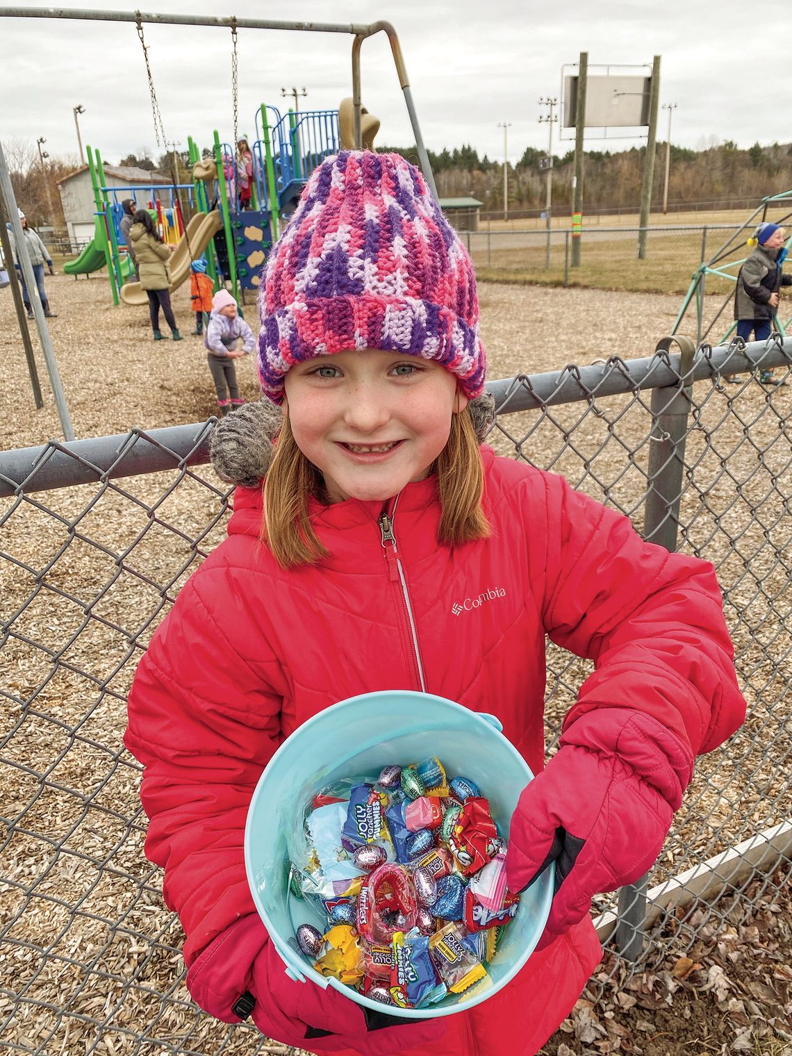 Claire Zionskowski Claire Zionskowski of Elmwood Township was among the many children who bundled up Saturday for the Cedar Eggstravaganza egg hunt Saturday. Courtesy photo