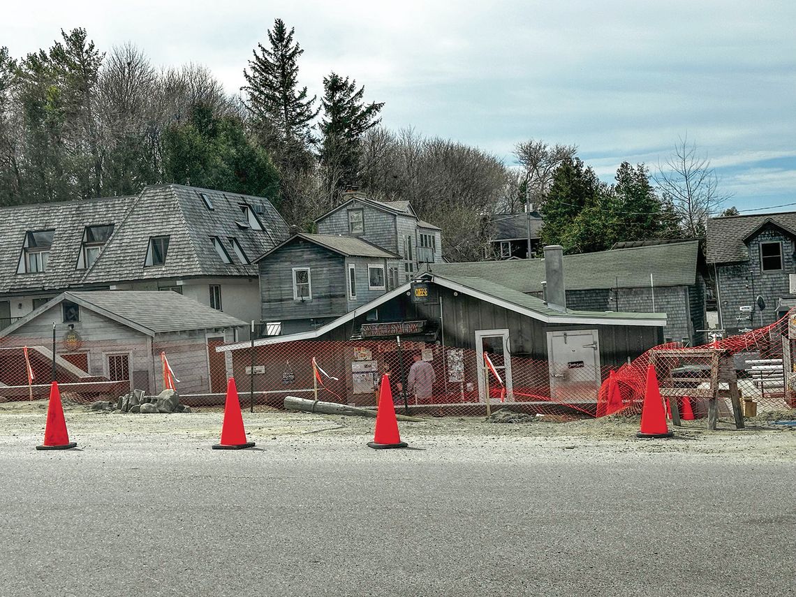Work on the walkways in Fishtown is underway, prepping for the upcoming summer season. Enterprise photo by Amy Hubbell