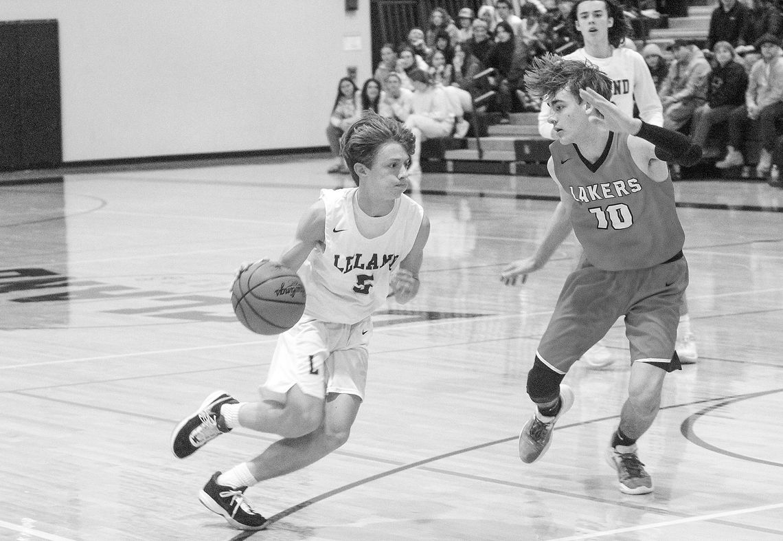 Leland senior Logan DeFour dribbles to the basket during a 65-28 win. Enterprise photo by Brian Freiberger
