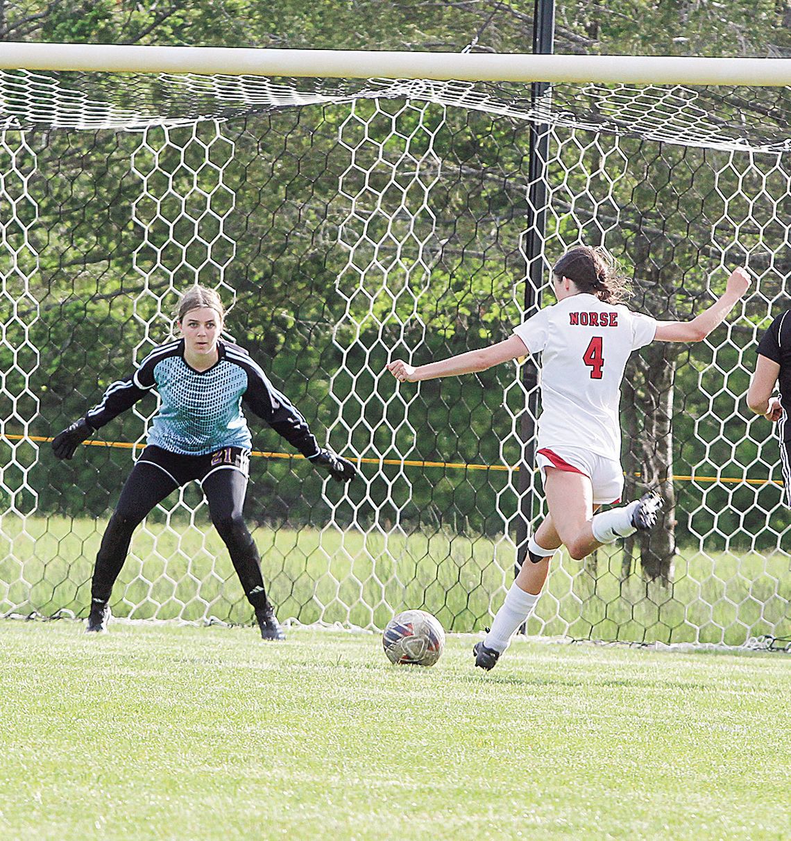 Suttons Bay senior Lauren Lint scores against Leland in the second half of a 3-1 loss against the Comets on Tuesday.