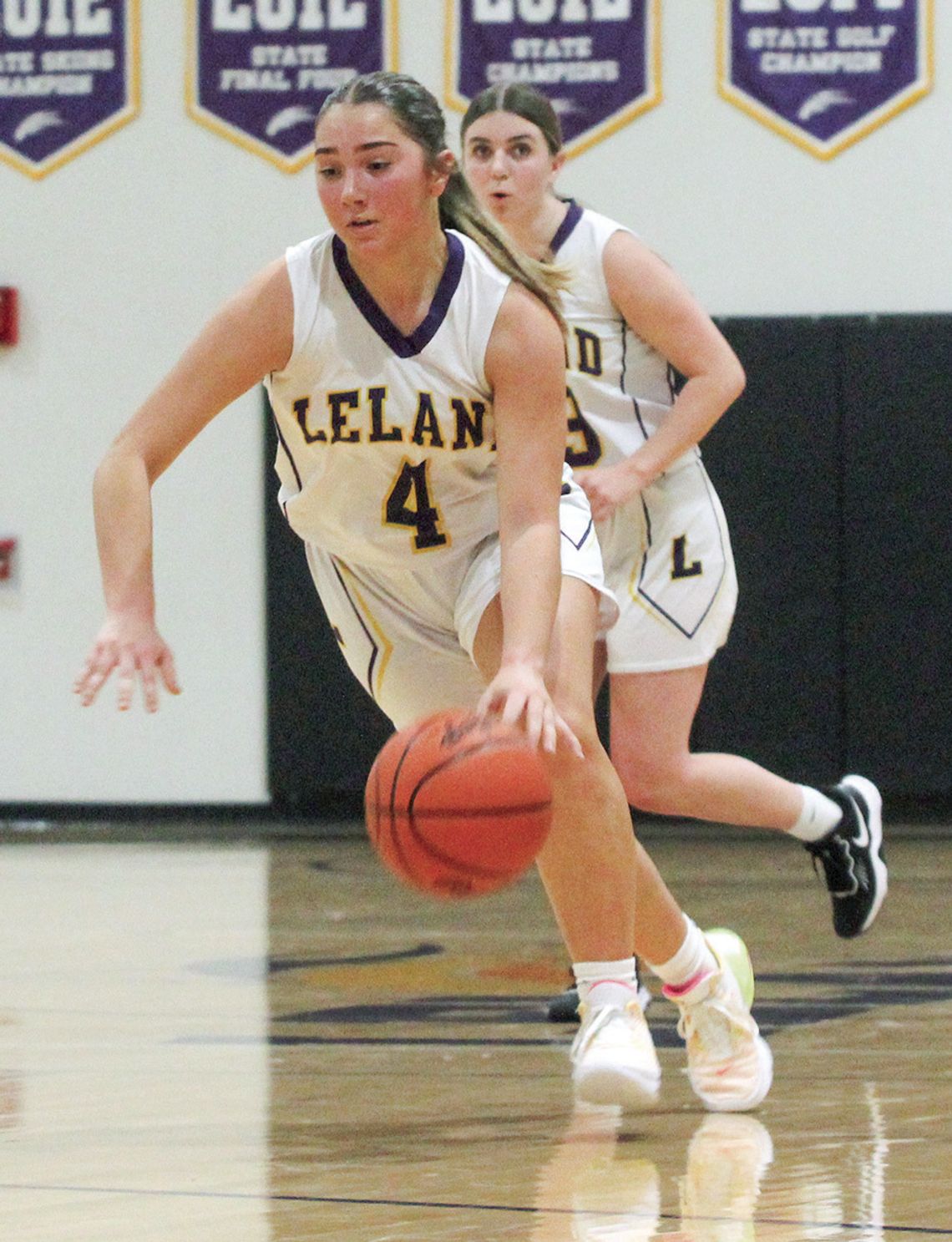 Leland senior Mallory Lowe drives to the basket against Suttons Bay last Thursday during a 51-9 win. Enterprise photo by Brian Freiberger
