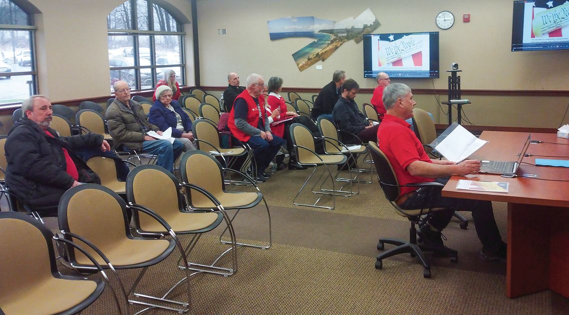 Jim Kobberstad, a Leelanau County resident, sits in front of the county board of commissioners at their Feb. 13 executive session. Kobberstad and 11 other meeting attendees successfully petitioned the board of commissioners on Jan. 24 to present for up to 55 minutes on alleged “security fl...