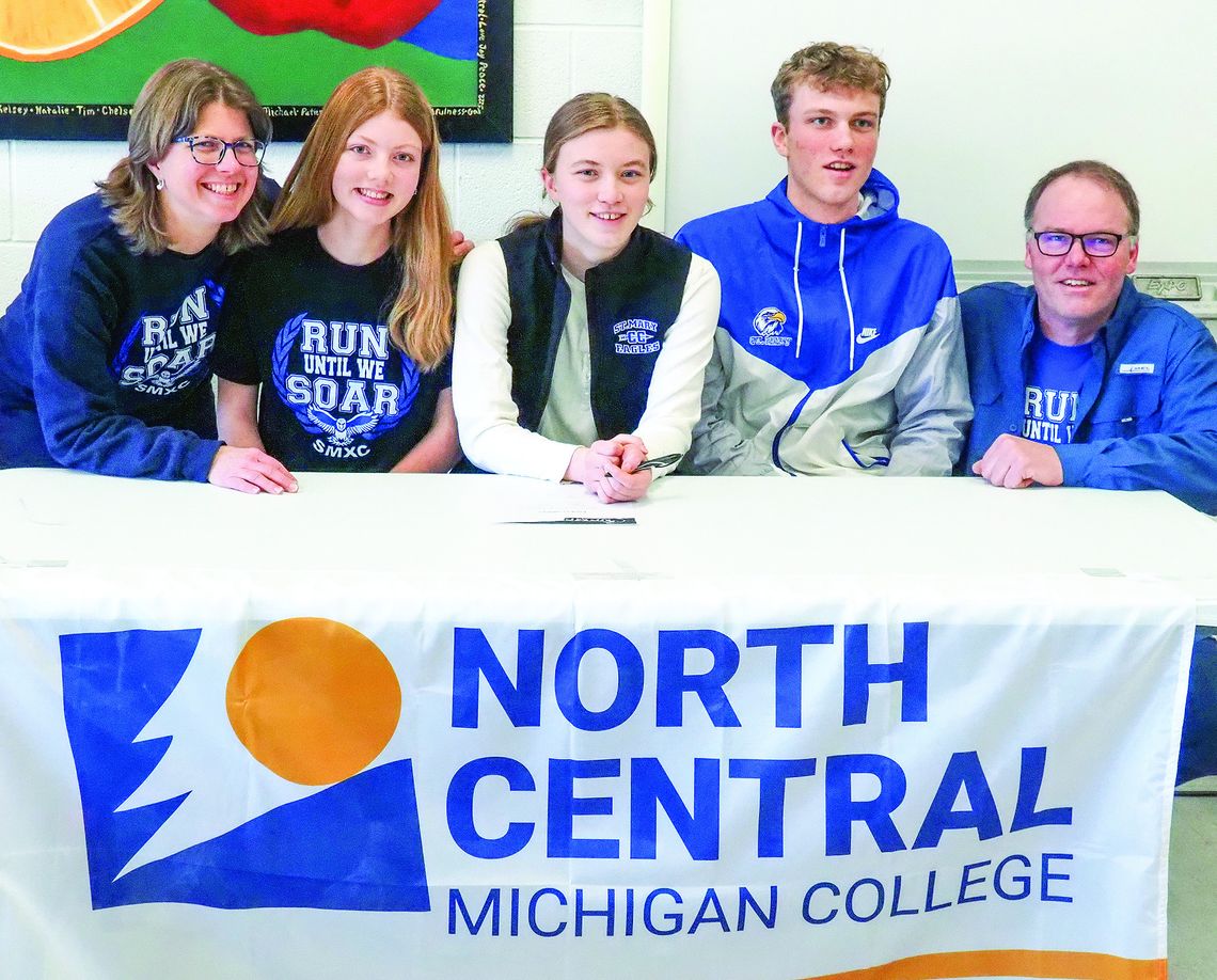 The Couturier family celebrates their daughter Kendra Couturier committing to North Central Michigan College in Petoskey last week. Photo courtesy of Brittany Rosendall