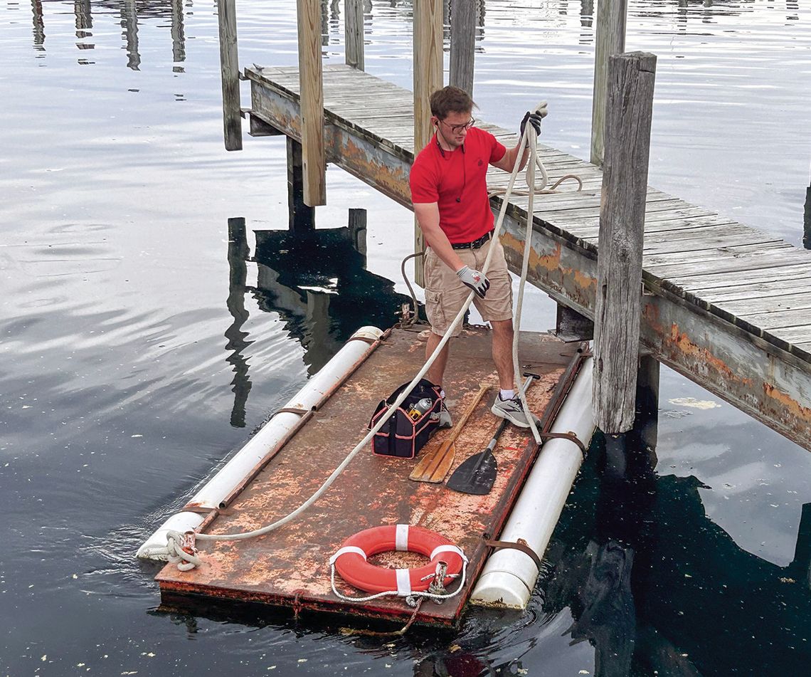 Dock hands keep Leelanau marinas and harbors going at the busiest time of the year — summer. Enterprise photo by Everett Howell