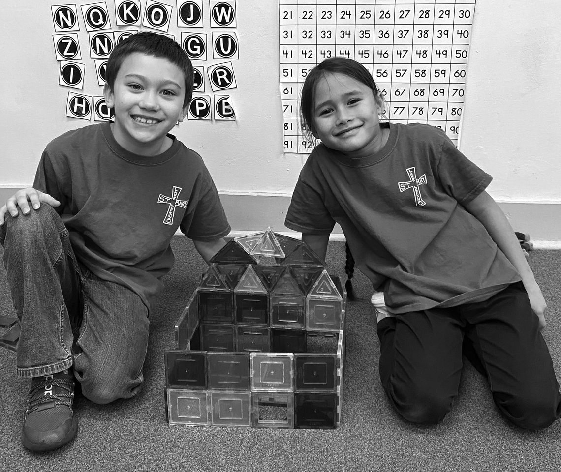During the school year During the school year, St. Mary students and staff celebrate Faith First Friday, the first Friday of each month. January 5. The first Friday of the new year, students and staff wore Faith First Friday T- shirts to show their commitment to the Catholic faith. Pictured from left are first g...