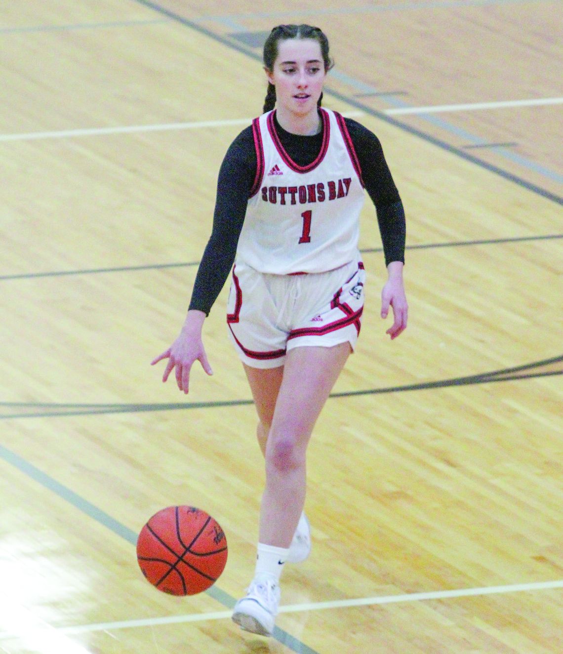 Hursh dribbles up the court against Lake Leelanau St. Mary last week.
