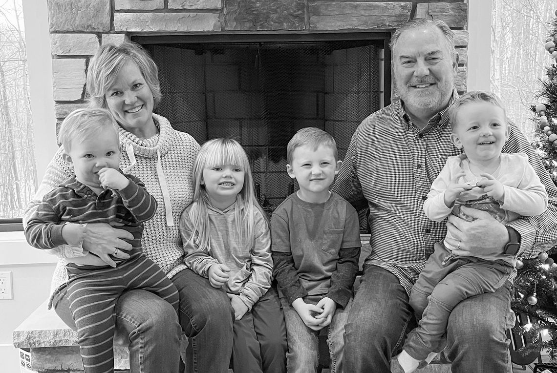 Tim Hurley (right) poses for a holiday photo with his wife, Anne, and four grandchildren. Recently, Tim and Anne welcomed their fifth grandchild into the world. Courtesy photo