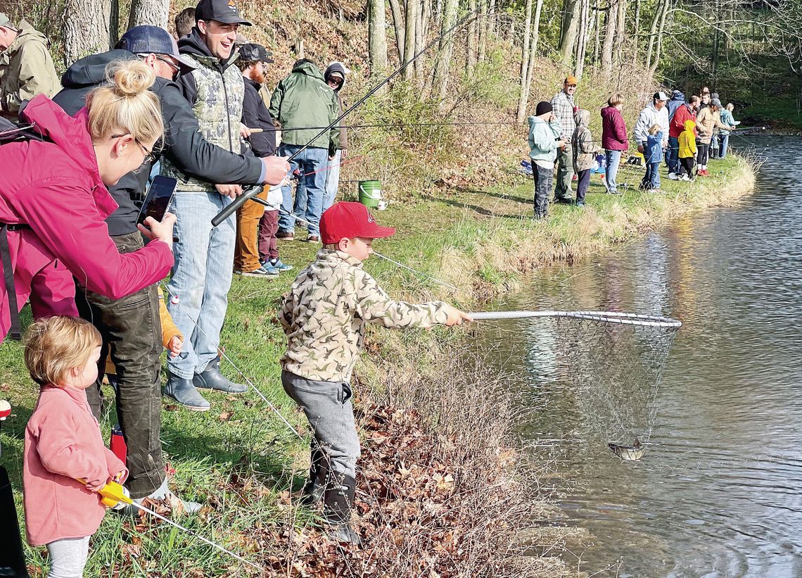 Families enjoyed the bit of sunshine Families enjoyed the bit of sunshine Saturday morning after the rain during the annual Scott Brow Kid’s Fishing Day at the Mill Pond in Northport. More fish derby photos on Pg. 7. Enterprise photo by Meakalia Previch-Liu