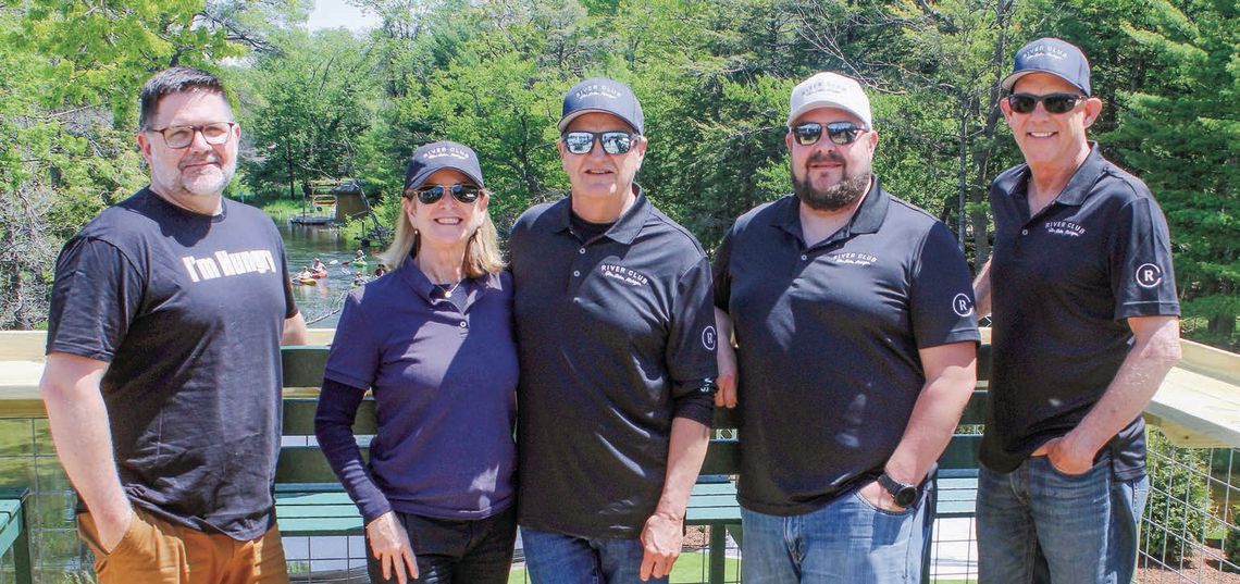 The River Club in Glen Arbor is preparing to open on June 20. From left to right: Steven Brotschul, Gina and Mike Sheldon, Matt Millu, and Chuck Damman. Enterprise photo by Brian Freiberger
