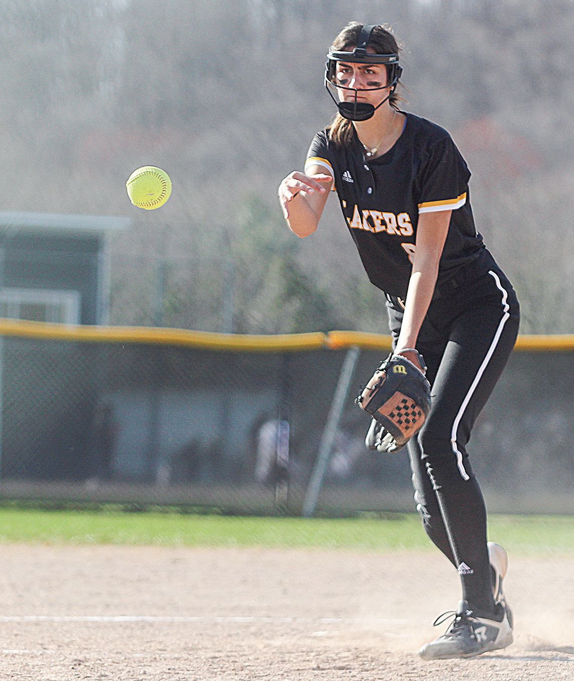 Glen Lake senior pitcher Paige Flores throws a strike against TC Christian on Saturday. Enterprise photos by Brian Freiberger