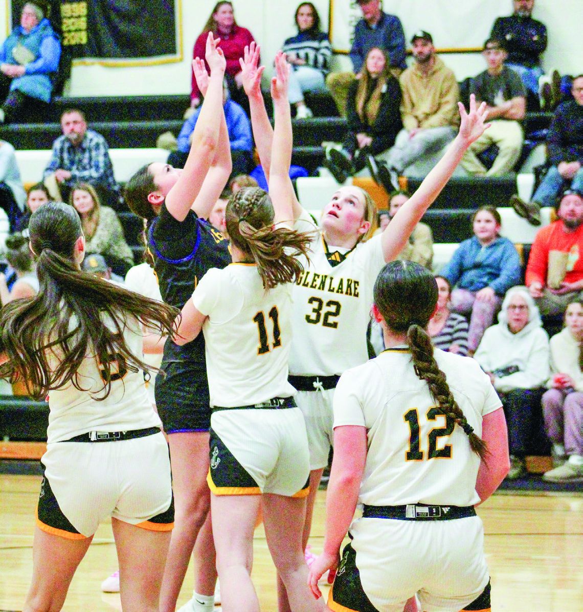 Glen Lake and Leland girls basketball teams compete