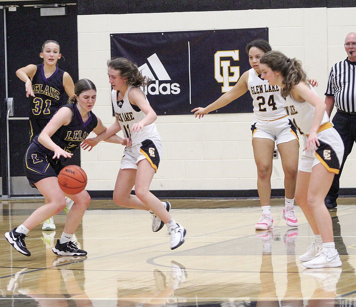 Glen LakeGlen Lake junior Hailey Anderson and Leland junior Elli Miller battle earlier this month in a Northwest Conference game Glen Lake junior Hailey Anderson and Leland junior Elli Miller battle earlier this month in a Northwest Conference game. Both Leland and Glen Lake girls basketball have had their ups and downs, but are beginning to find their stride. Enterprise photo by Brian Freiberger