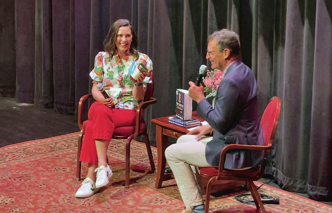 Governor Gretchen Whitmer was presented with her very own inspired product, “True Gretch Cherry Salsa,” from Cherry Republic Founder Bob Sutherland at the National Writers Series event on July 31. Enterprise photo by Meakalia Previch-Liu