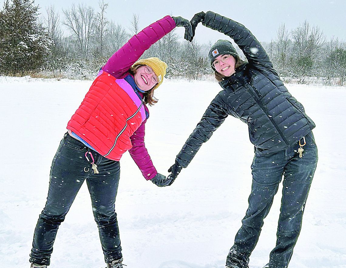 Youth volunteers pose while exploring Sleeping Bear Dunes National Lakeshore on snowshoes. Photo courtesy of the National Park Service.