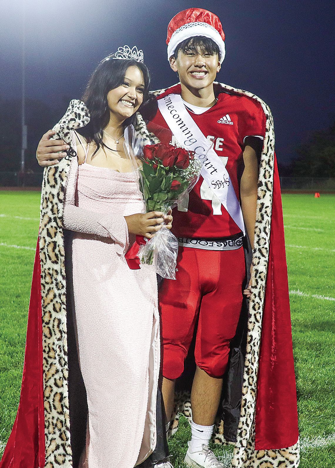 Suttons Bay senior Austin Vang and Michelle Arroyo were named king and queen during a homecoming football game Friday.