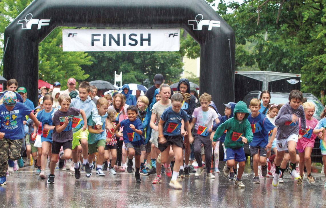 Hundreds of kids braved the rain at the 17th annual Running Bear Run in Glen Arbor on Tuesday. The race is sponsored by the Glen Arbor Women’s Club and 90% of the proceeds from our race provide scholarships for Glen Lake School seniors, with the remainder going toward other community chari...