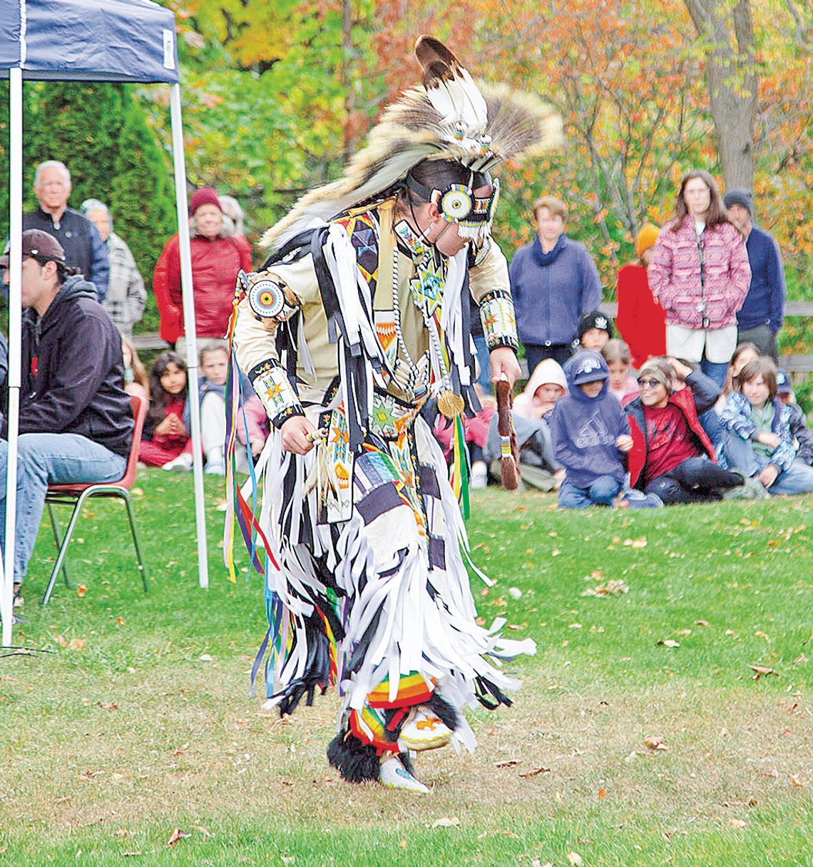 A tribal dancer is pictured at the beginning of Indigenous Peoples’ Day activities held at the Leland Cultural Campus on Monday. There were well over 100 people on the lawn, including students from Leland Public School. Photo courtesy of Mark Morton