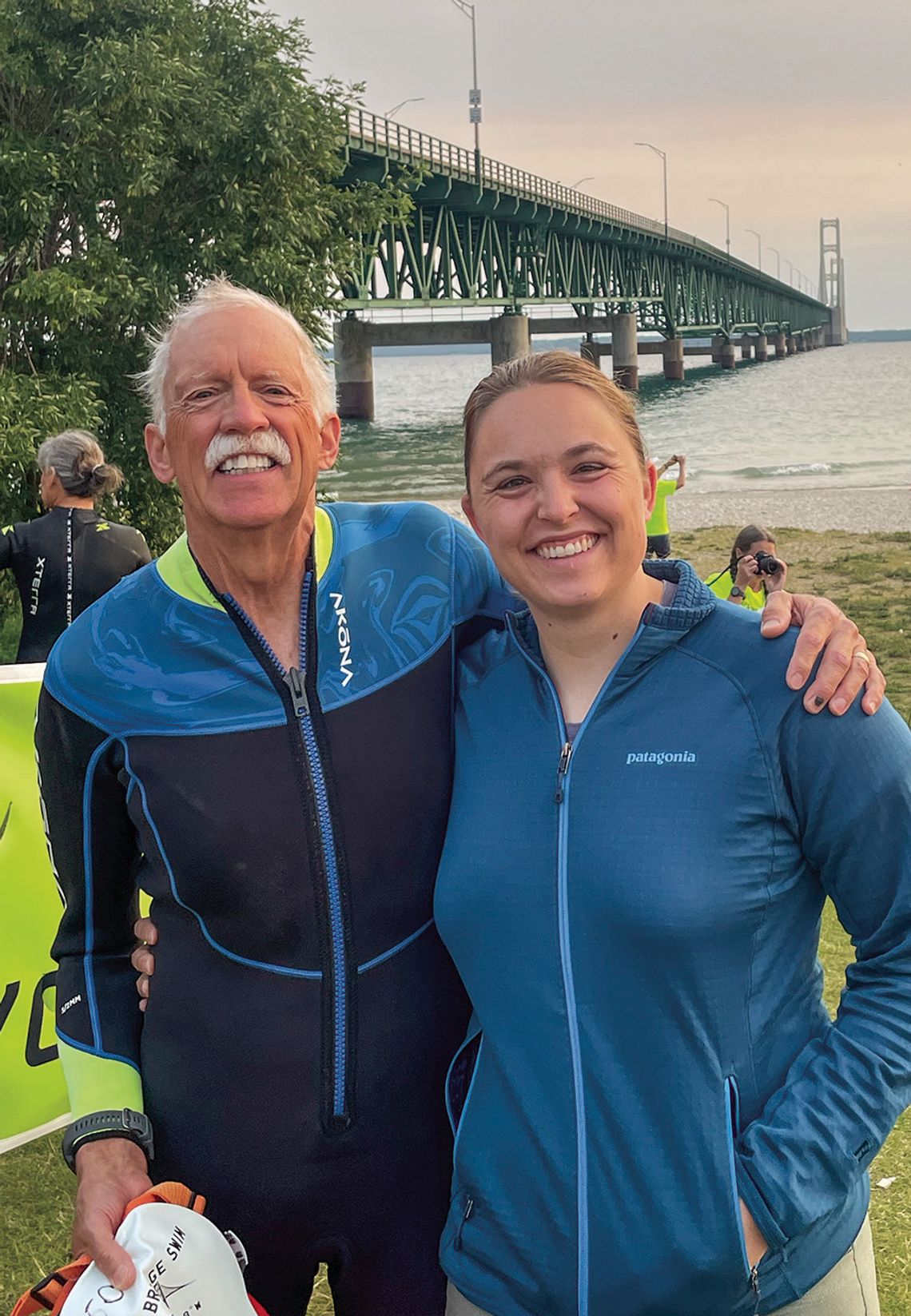 Lee Jameson conquered the Mackinac Bridge swim earlier this summer during a fundraiser. Jameson, 70, shown here with daughter Emily, retired from the Sleeping Bear Dunes National Lakeshore a few years ago. Courtesy photo