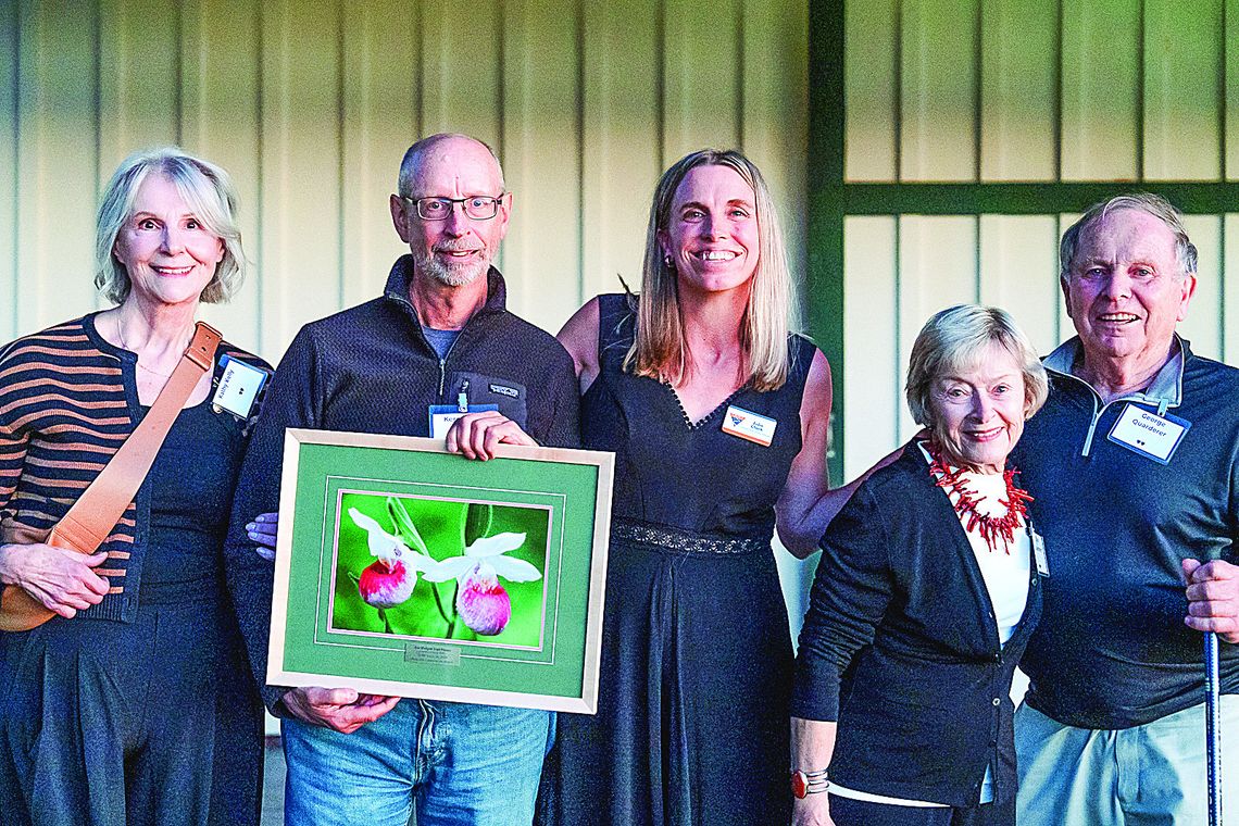 Kerry Kelly was named the winner of TART Trails 2024 Jim Mudgett Trail Pioneer Award. Pictured from left are his wife, Kathy Kelly; Kelly; Julie Clark from TART Trails; Carol Quarderer and Friends of Sleeping Bear board member George Quarderer. Courtesy photo