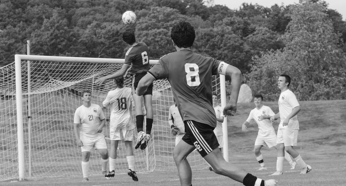 Glen Lake sophomore Ezra Belanger rises for a header shot against Reed City on Monday. Enterprise photo by Brian Freiberger