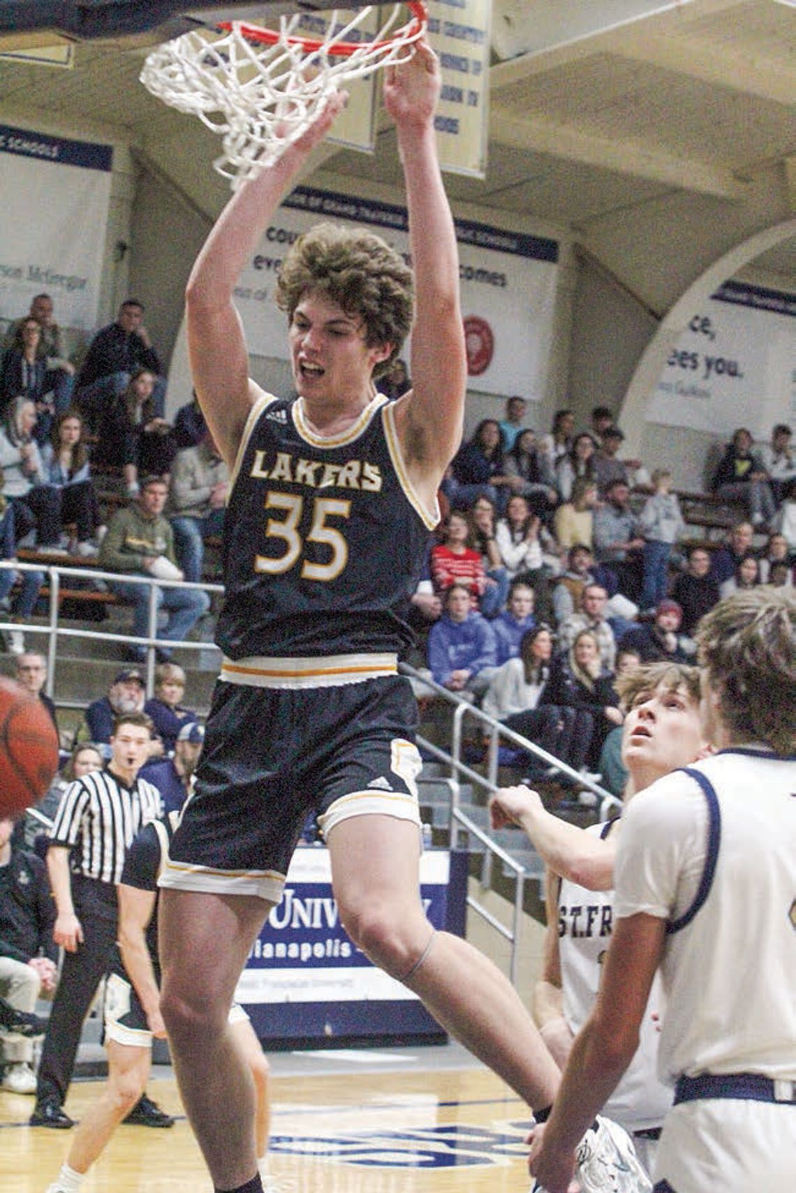 Glen Lake sophomore Jacob Plamondon throws down a dunk against TC St. Francis during the Northern Michigan Basketball Showcase on Saturday. The Lakers defeated the Gladiators 55-42. Enterprise photo by Brian Freiberger