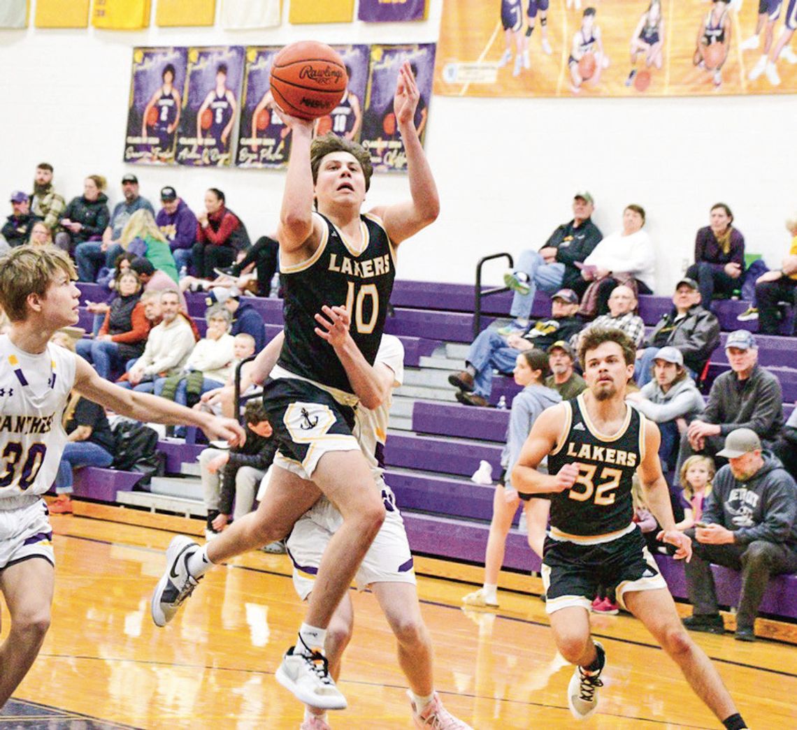 Glen Lake junior Keaton LaCross drives the lane against Frankfort Friday. The Lakers beat the Panthers for the second time this season 57-30. Photo Courtesy of Jill Plamondon