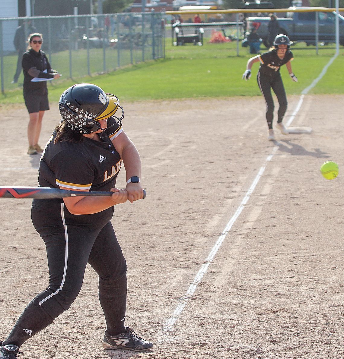 Glen Lake senior Ella Flores smashes a single against TC Christian earlier this month. Enterprise photo by Brian Freiberger