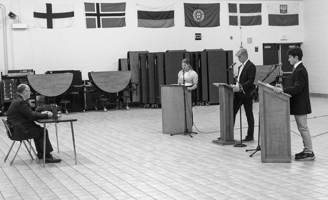 Glen Lake seniors Kyra Lamb (left), Sully Seymour (middle) and Noah Scott (right) participate in a mock election Monday. Enterprise photo by Brian Freiberger