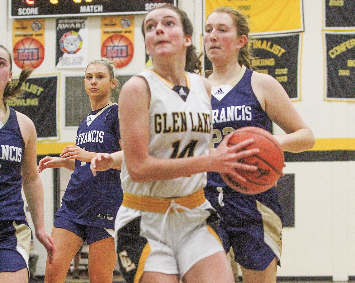 Glen Lake junior Jessie Pugh scores a bucket late in the fourth quarter against St. Francis in a 36-32 win. Enterprise photo by Brian Freiberger