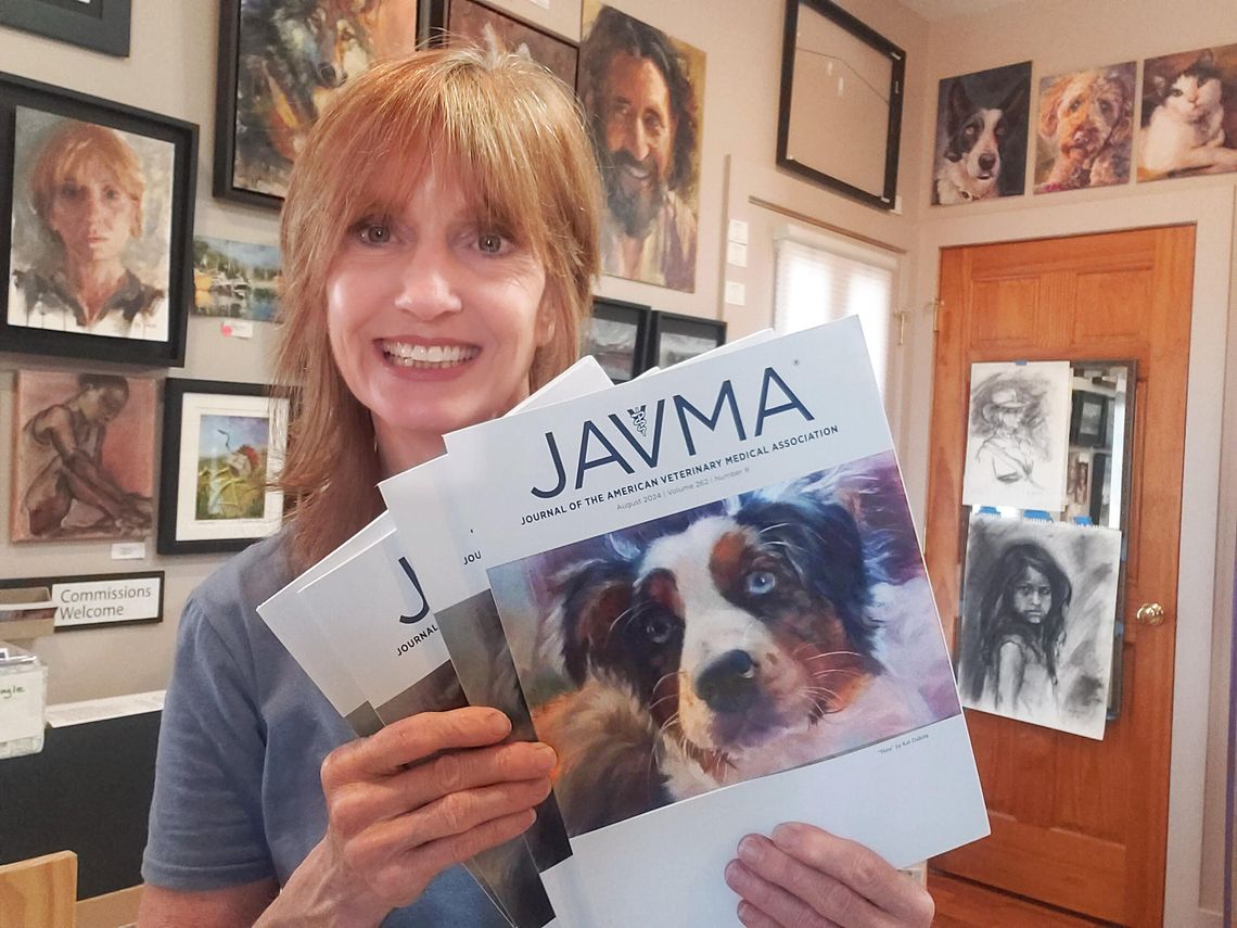 Kat Dakota’s artwork, pictured here, is featured on the August issue of the Journal of American Veterinary Medical Association. Courtesy photo