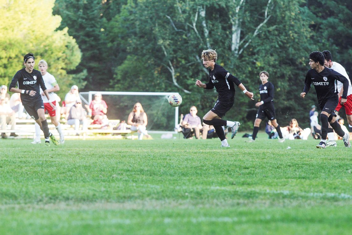 Leland senior Max Waldrup leads the Comet attack in a 7-0 win over Benzie Monday. Enterprise photo by Brian Freiberger