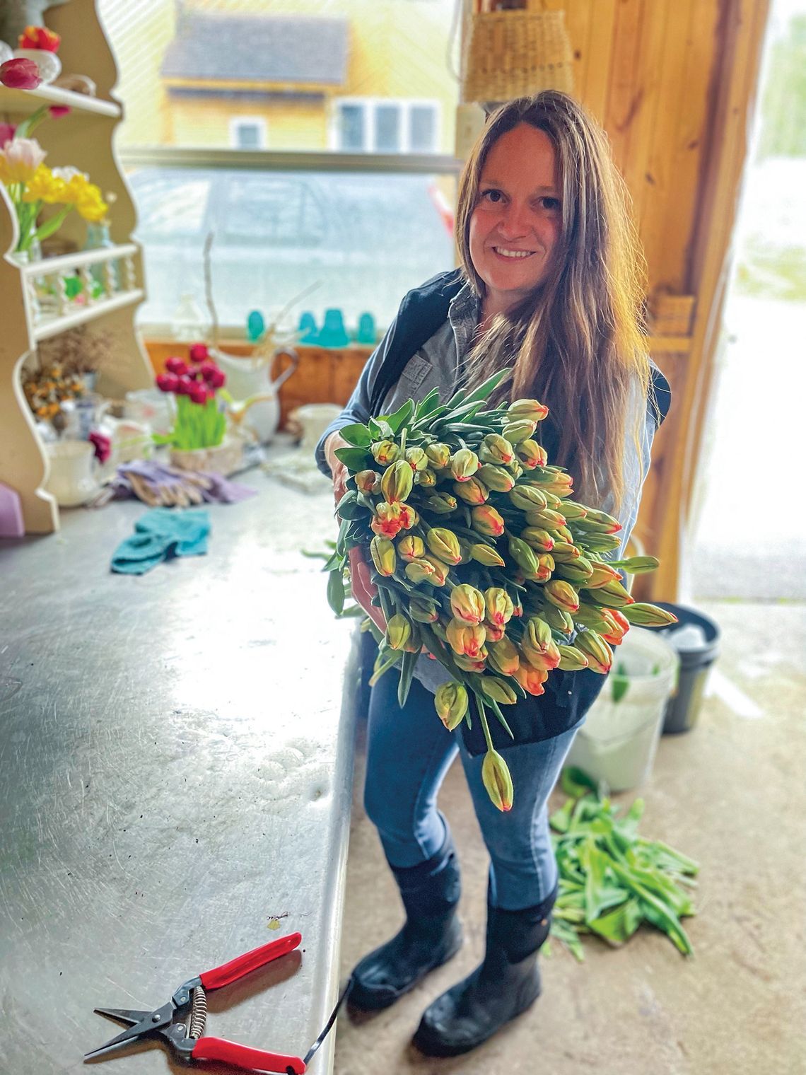 Michelle Shackelford Michelle Shackelford, owner of Leelanau Specialty Cut Flowers in Cedar, is ramping up for a busy spring, summer, and fall as she begins to harvest flowers from early May until Christmas. Enterprise photo by Brian Freiberger
