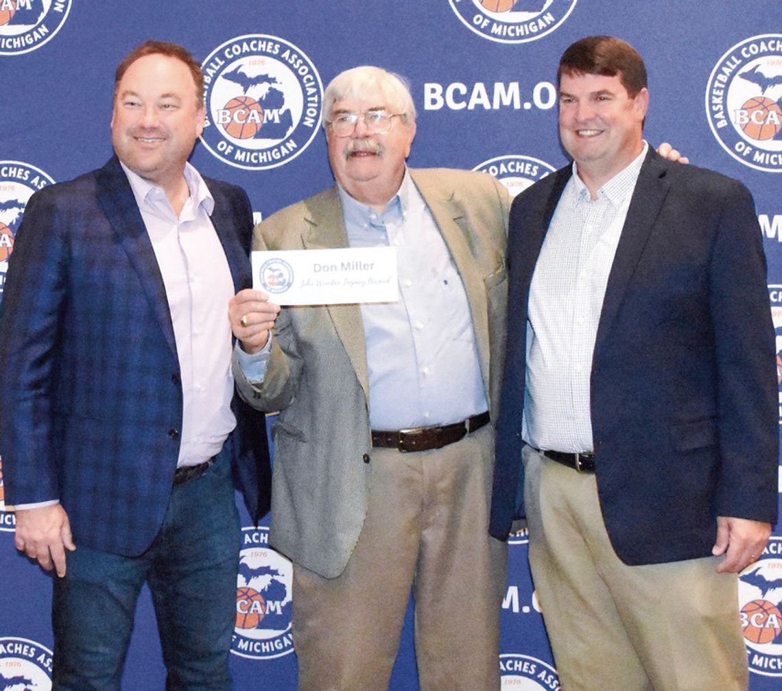 Don Miller stands with former players Brad Fosmore and Todd Ciolek during the John Wooden Lifetime Achievement Award presentation Sunday in Detroit. Courtesy photo
