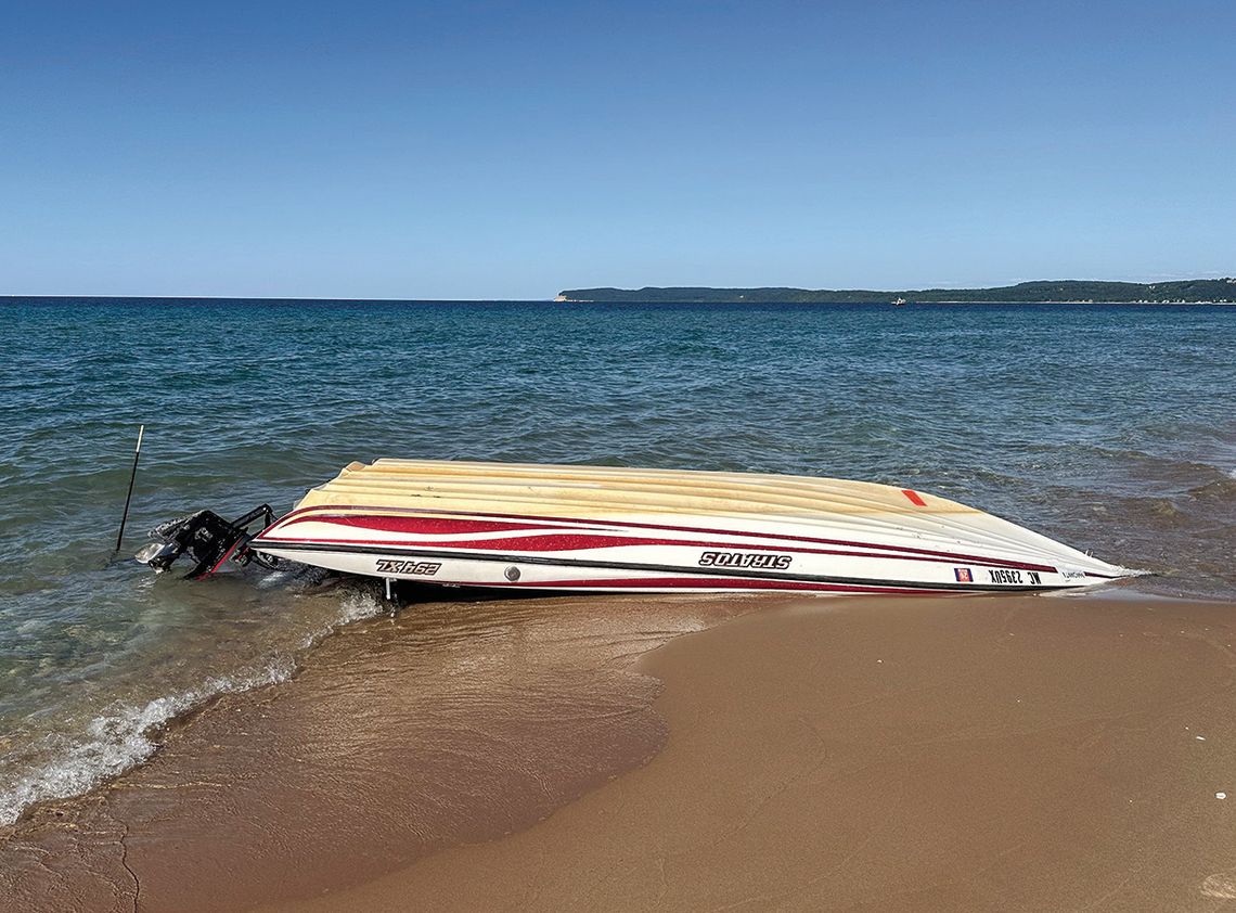 The U.S. Coast Guard and Park Service staff have been busy with two boat mishaps on Lake Michigan Friday and Saturday. Two fishermen were rescued Friday after their boat went down off Frankfort. This boat washed up on Sleeping Bear Point. The body of a downstate man whose kayak turned over...