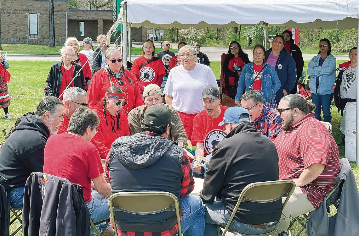 People are pictured gathered around the drum circle at the Grand Traverse Band of Ottawa and Chippewa Indians’ third annual Missing and Murdered Indigenous People (MMIP) Day of Awareness event last Friday in Traverse City. Enterprise photos by Meakalia Previch-Liu
