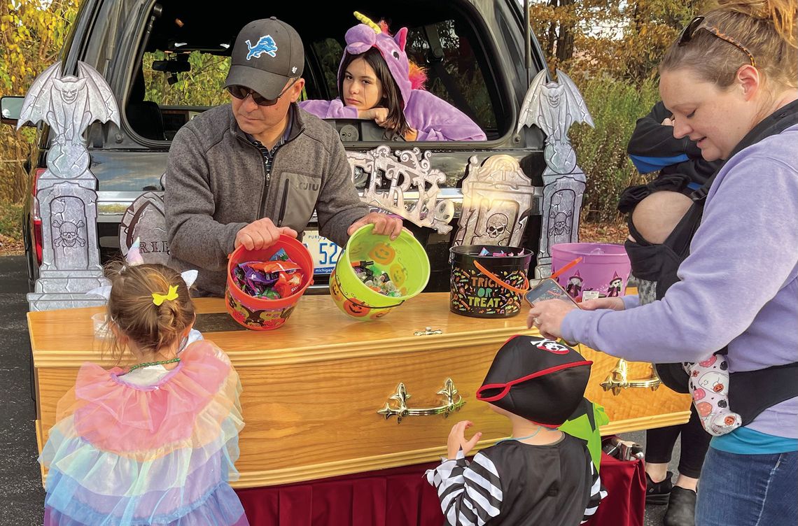 Nick Martinson Nick Martinson of Martinson Funeral Home went all out for St. Mary School’s trunk-or-treat, bringing candy and a casket. Enterprise photo by Mike Anderson