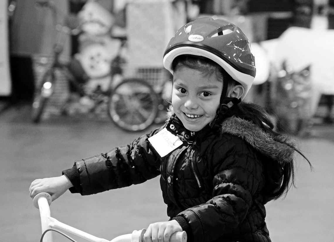 Robert Barnes of Glen Arbor’s non-profit Free Bikes 4 Kidz Detroit” (FB4K) has brought smiles to more than 12,000 children in the Detroit area by providing new bikes and helmets. Courtesy photo