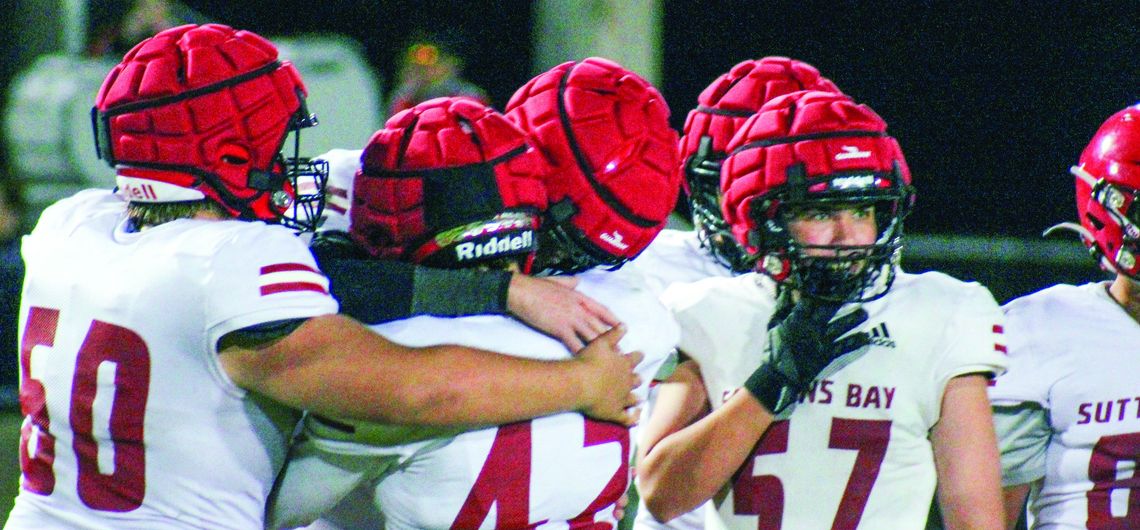 Suttons Bay teammates hug after their last game against Mesick earlier this month. Photo courtesy of Cynthia Opie