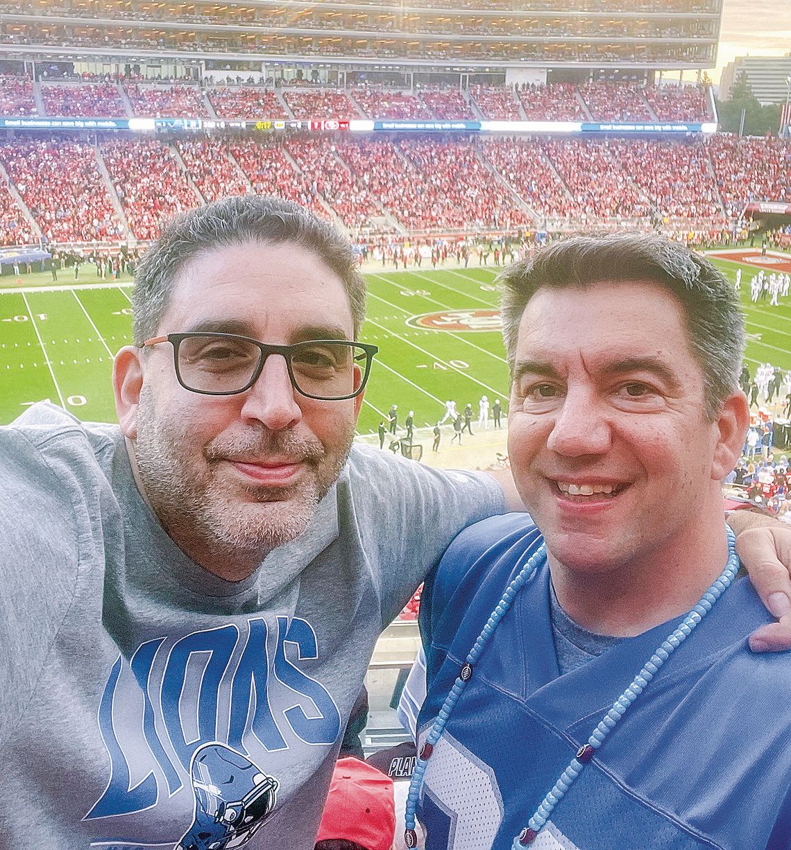 Matt Soltysiak, podcast host and Glen Lake Spanish teacher (right), went to the NFC Championship game with his friend Micheal Feinstein, who flew to San Francisco from Seattle. Courtesy photo