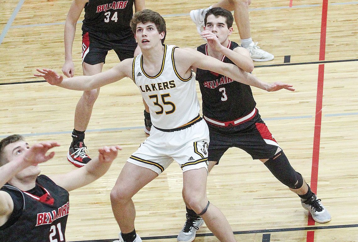 Glen Lake sophomore Jacob Plamondon posts up during a regional final against Bellaire. Plamondon and junior Benji Allen were named first team all-Northwest Conference for the 2023-24 season.