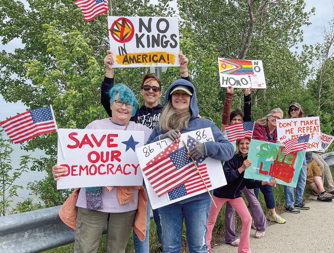 People gathered peacefully at the Narrows in Glen Arbor Saturday to participate in a "No Kings