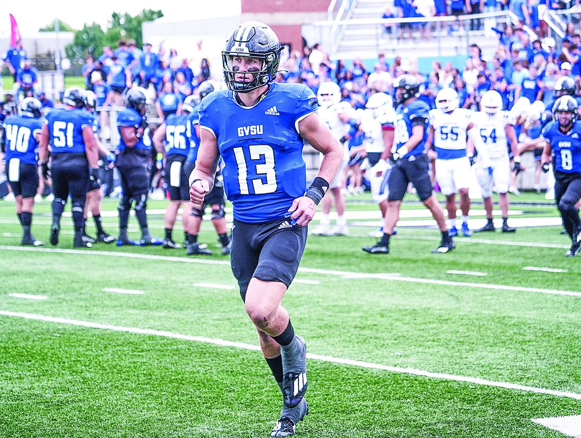 GVSU senior quarterback Cade Peterson prepares for action earlier this season. Peterson threw for 5,115 yards and 47 passing touchdowns to be named a 2023 Harlon Hill award finalist. Courtesy photo