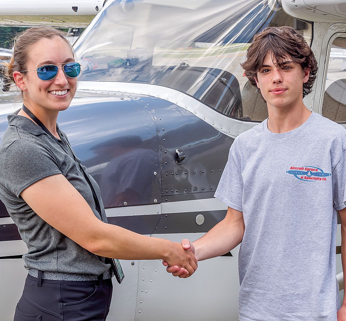 Joel Plamondon accepts an $11,000 scholarship to further pursue aviation. The high school juniors will be pursuing a career in aviation with the hopes of becoming a commercial airline pilot. Courtesy photo