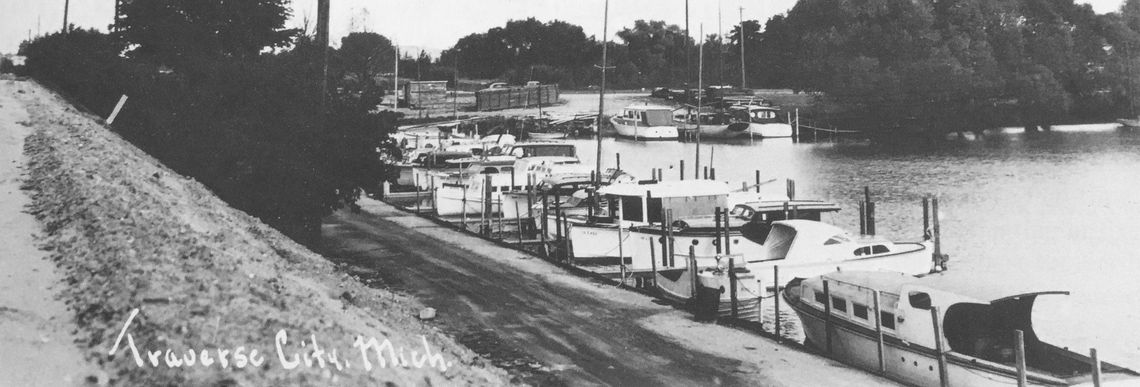 The Ray Darrow Marina became Rennie Marina. Both owners sold and repaired watercraft and rented marina space. Rennie’s own 38-foot trawler, Ren’s Nest, previously the Bonnie, was a familiar boat seen at the marina and plying around Grand Traverse Bay and beyond. Photo courtesy of Jim Renni...
