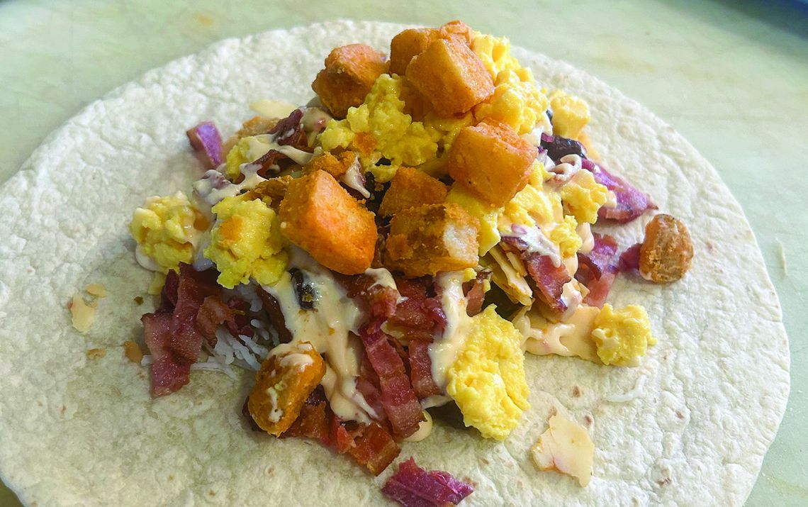 The spicy bacon breakfast burrito is a restaurant week menu special item at New Bohemian Cafe available from April 27-May5. The business will also have deals on items like a honey almond latte for $5, a breakfast deal that includes any breakfast burrito and a drip coffee or cold brew for $...