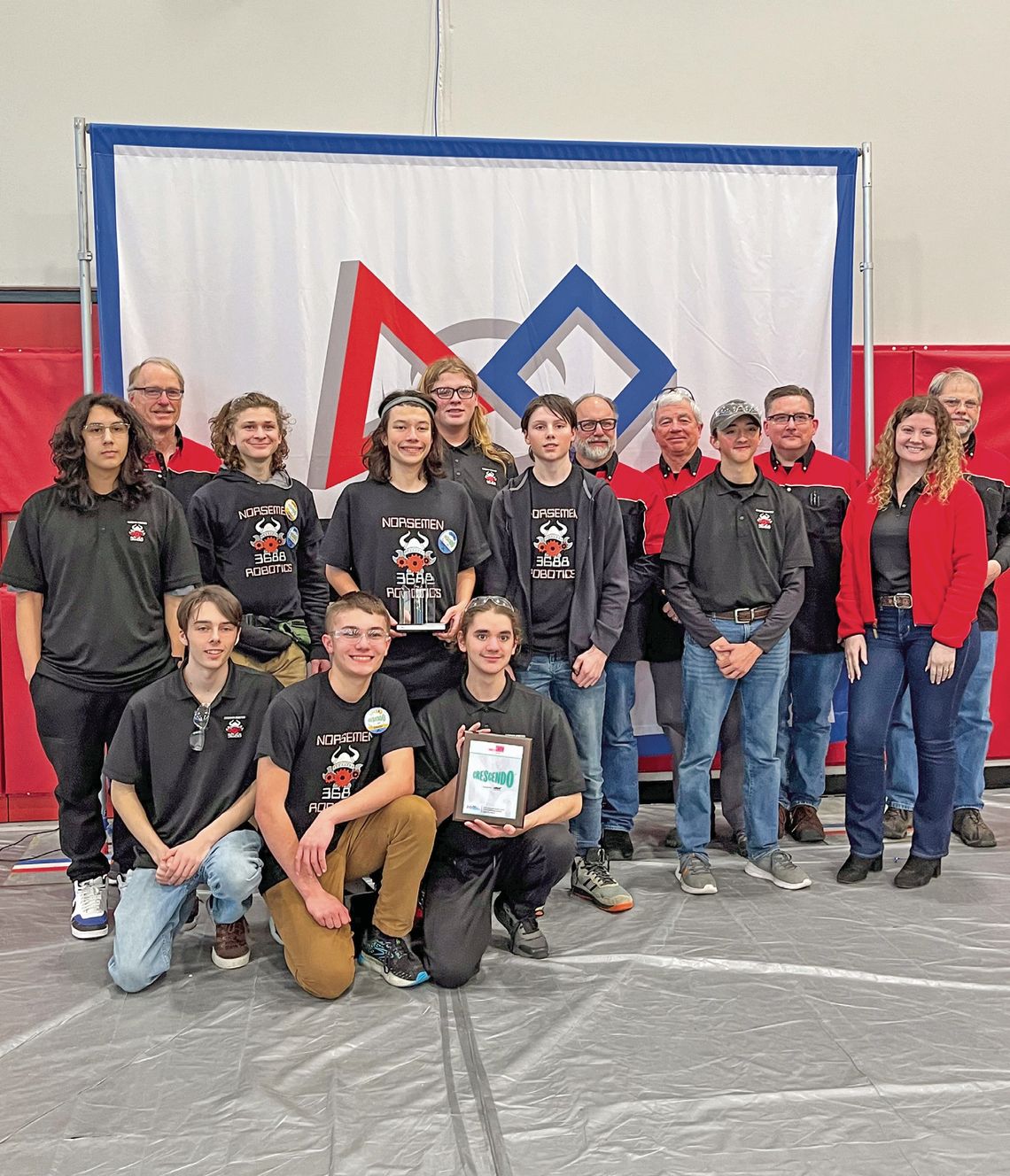 Front row (left to right): Norsemen team members Dean Hulett, Jacob Gulley, Casey Porter; middle row: team members James Miller, Jack Shiner, Michael Rokita, Koen Kruk, and mentors Chase Porter and Emma Grant; Back row: mentor Andy Brandt, team member Alex McCormick, and mentors Bill Klein...