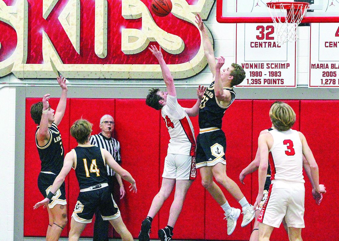 Glen Lake senior Dylan Cundiff blocks a Benzie shot during a Northwest Conference championship game last week. Enterprise photos by Brian Freiberger