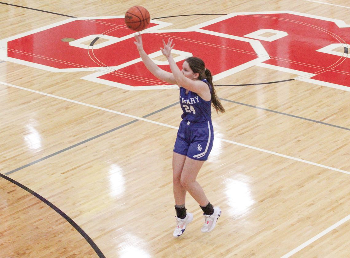 Lake Leelanau St. Mary senior Sarah Bunek hits a 3-pointer against Suttons Bay on Tuesday. Enterprise photos by Brian Freiberger