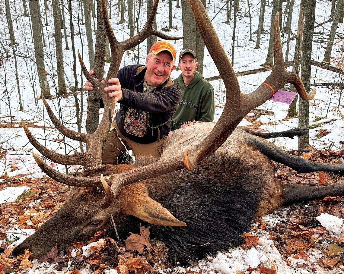 Roger Schaub, left, stalked elk with guide James Bunker for six days before they caught up with this 700-pound trophy. Schaub’s gun went click, but the second shot worked. Courtesy photo